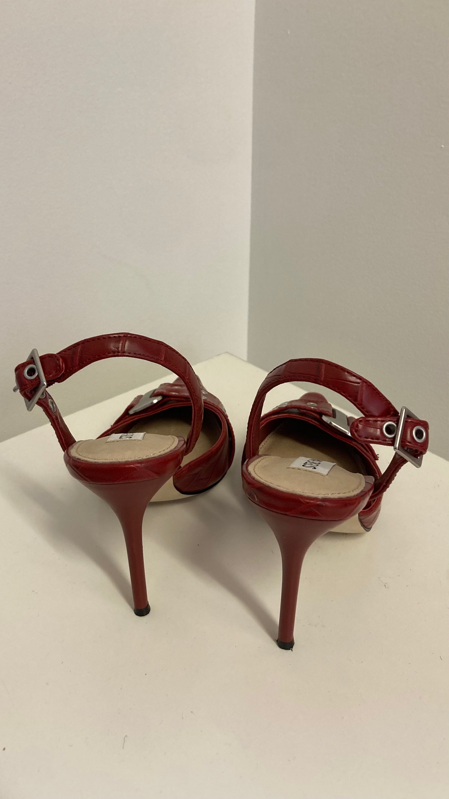 Red Buckled Stilettos'