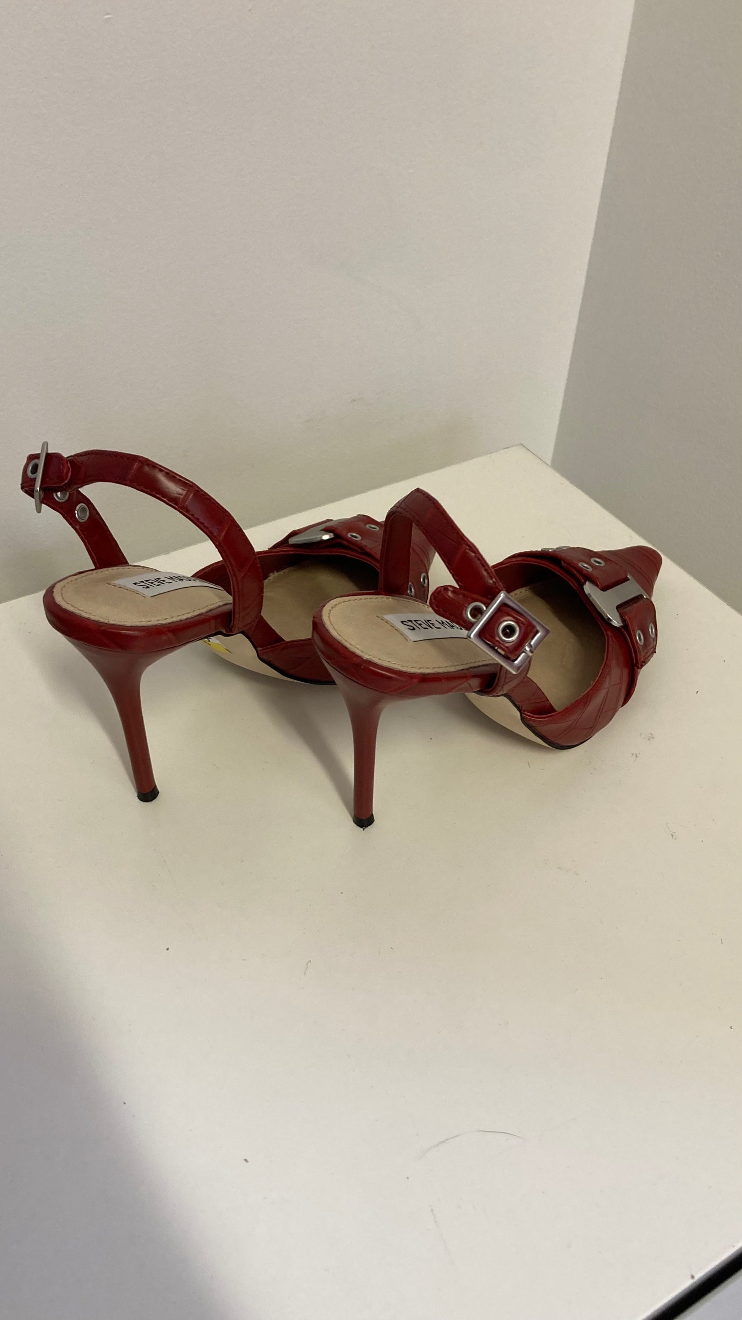 Red Buckled Stilettos'