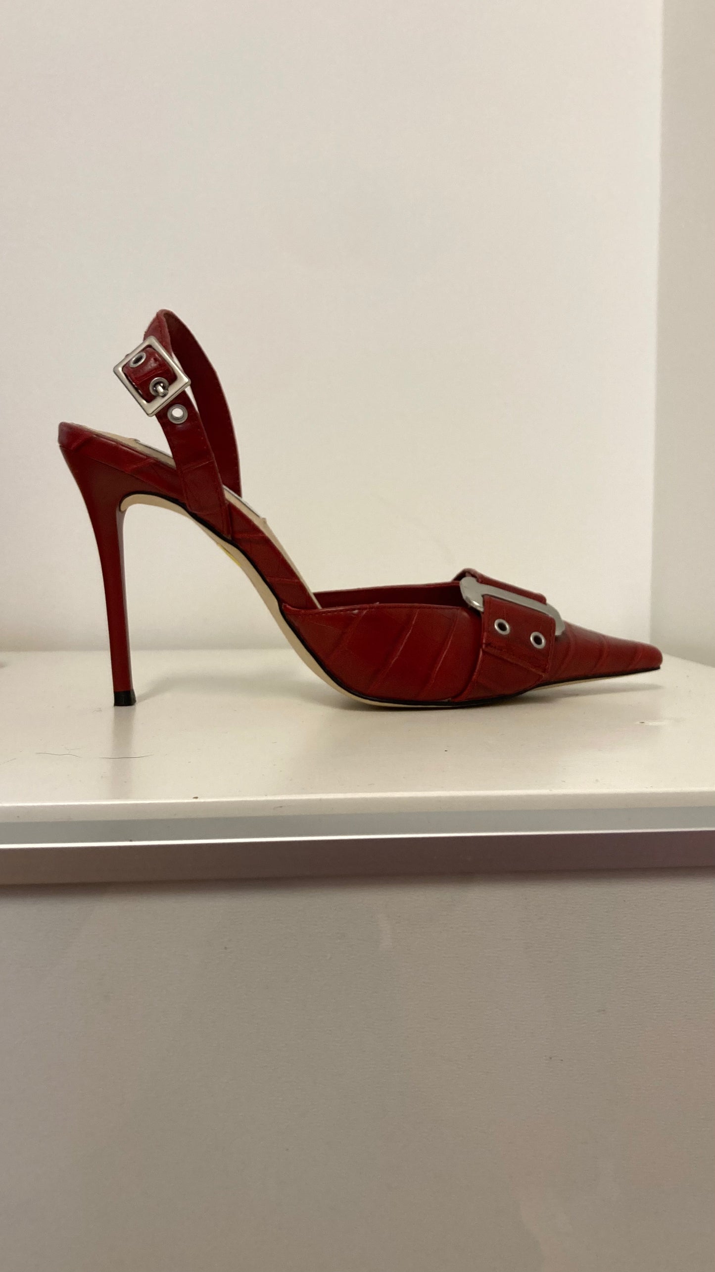 Red Buckled Stilettos'