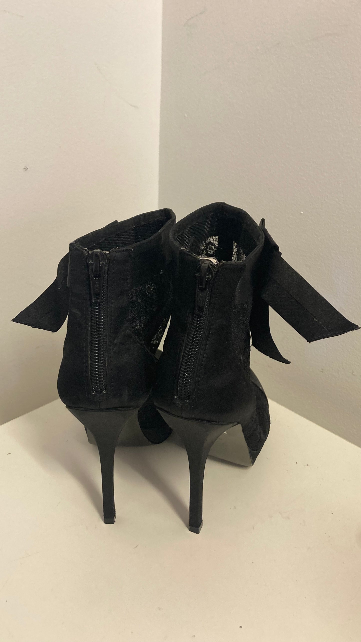 Black Lace Booties With A Stiletto Heel
