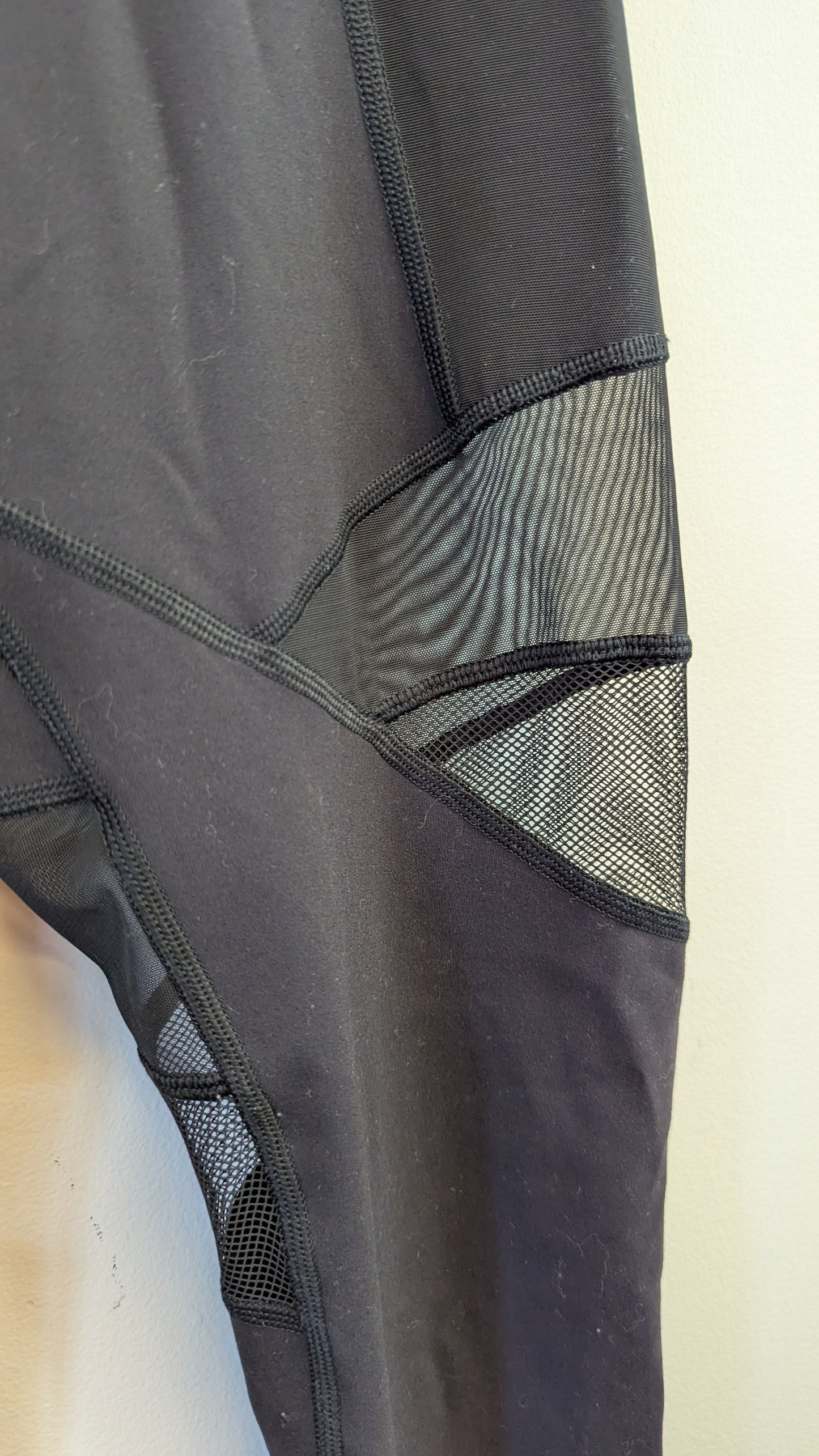 Lululemon Black Athletic Leggings with Mesh Panels and Pockets