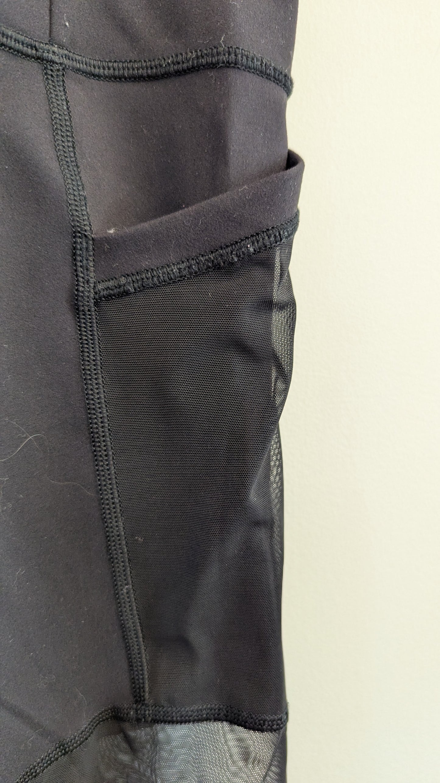 Lululemon Black Athletic Leggings with Mesh Panels and Pockets